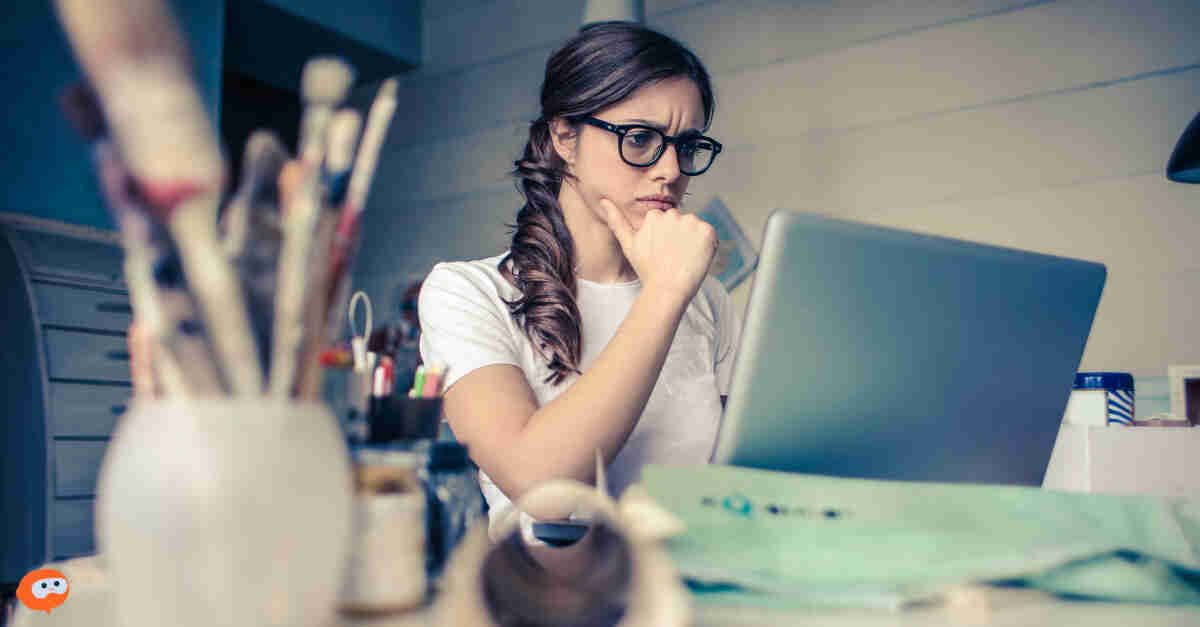  A woman using AI to complete a task, looking confused